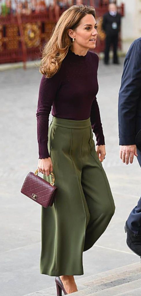 KHAKI pants and purple top