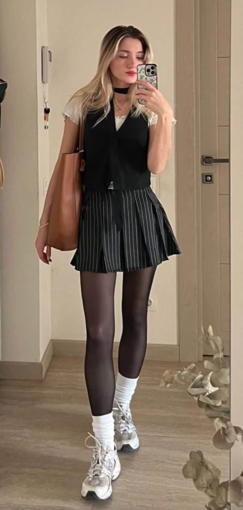 short pleated skirt and tights