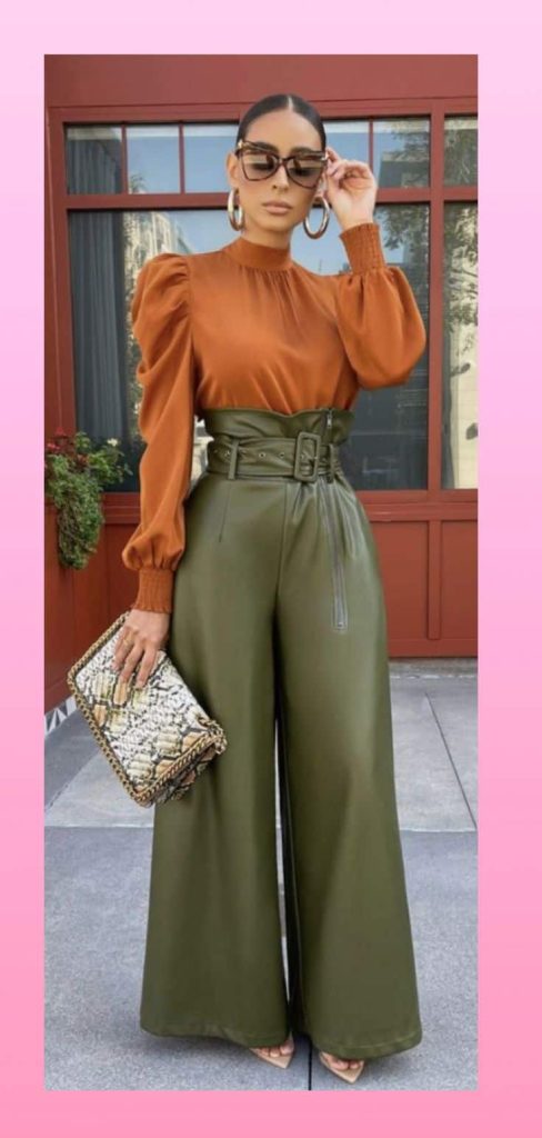 brown top and emerald green pants