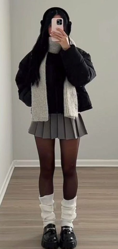 short pleated skirt and leg warmers