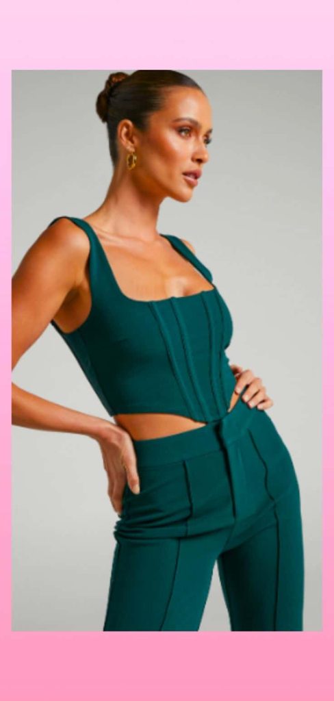 corset top and emerald green pants