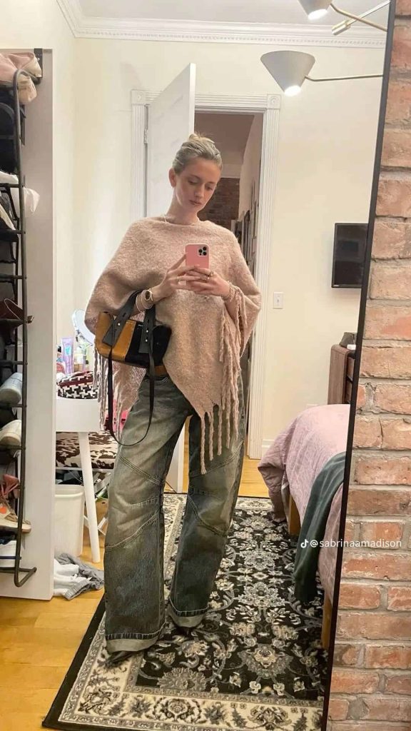 asymmetrical poncho outfit with jeans