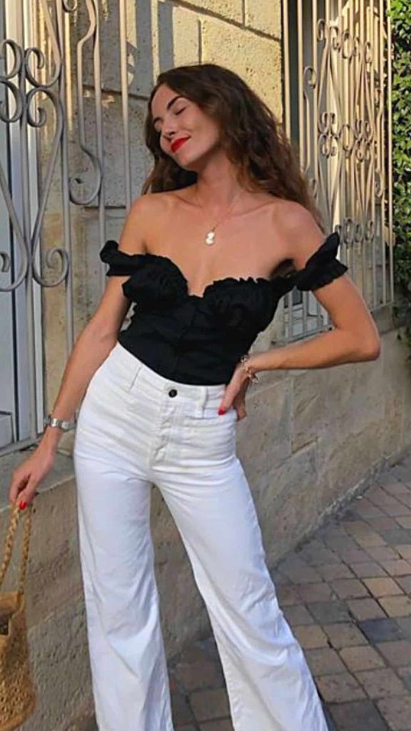 white jeans and black blouse