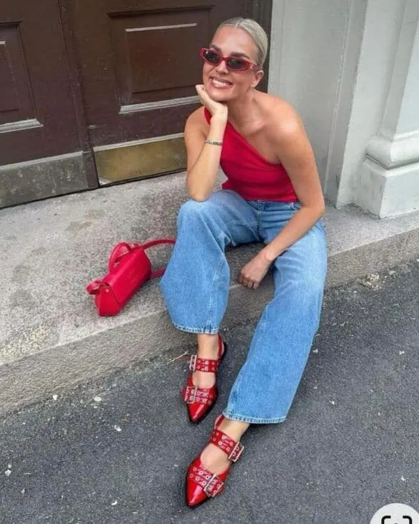 red one shoulder top and jeans