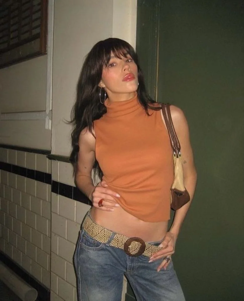 sleeveless turtleneck top outfit