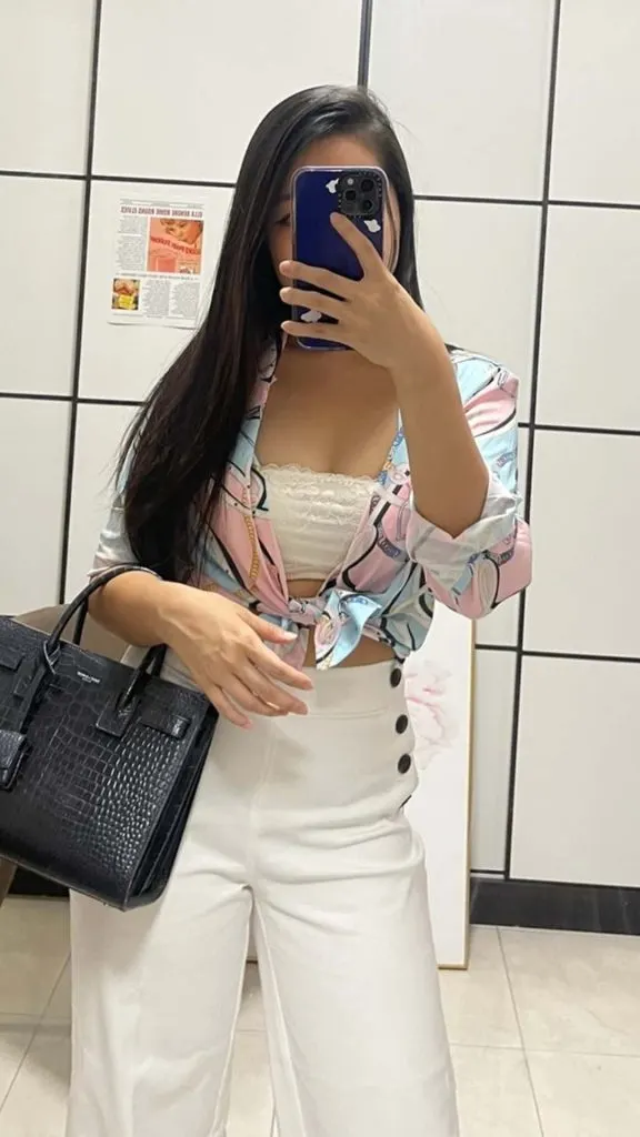 colorful cropped shirt and white jeans